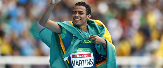 2016 Rio Paralympics - Athletics - Men's 400m - T20 Final - Olympic Stadium - Rio de Janeiro, Brazil - 09/09/2016.  Daniel Martins of Brazil celebrates after winning the gold medal in the event.  REUTERS/Jason Cairnduff  FOR EDITORIAL -- -- USE ONLY. NOT FOR SALE FOR MARKETING OR ADVERTISING CAMPAIGNS.