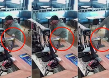 Homem está ao lado do copo, mas em nenhum momento ele se mexe e parece que alguém empurra a cerveja. Foto: Reprodução