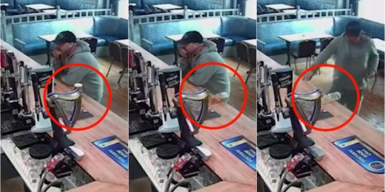 Homem está ao lado do copo, mas em nenhum momento ele se mexe e parece que alguém empurra a cerveja. Foto: Reprodução