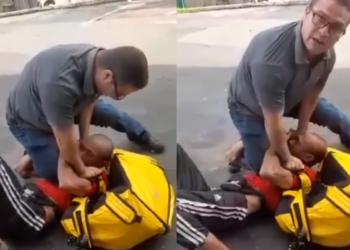 Homem não se intimidou com a câmera e continuou agredindo o trabalhador. Foto: Reprodução