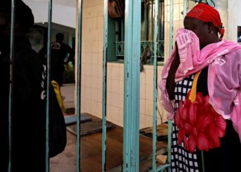 Ndeye Absa Gueye, the grandmother of a ten-day-old baby, reacts as she waits outside the hospital, where newborn babies died in a fire at the neonatal section of a regional hospital in Tivaouane, Senegal, May 26, 2022. REUTERS/Zohra Bensemra