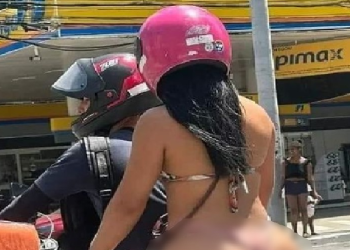 A mulher foi flagrada por uma pessoa no trânsito. Foto: Reprodução