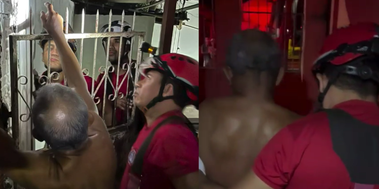 Os bombeiros tiveram que serrar a grade. Foto: Reprodução