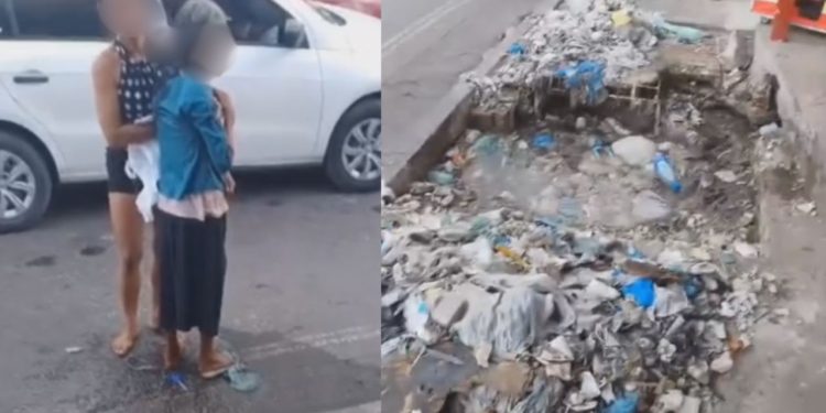Vídeo: Idosa cai em bueiro aberto e quase se af0ga em rua tomada pelo lixo em Manaus
