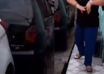 Mulher se revolta e fura pneu de carro estacionado em frente à garagem no Alvorada e causa confusão; VÍDEO