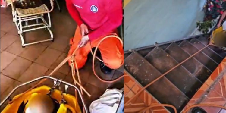 Vídeo: Bombeiros resgatam idosa que caiu em área de difícil acesso no Lírio do Vale