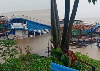 Uma embarcação batizada com o nome “C. Nel Tavares” afundou nas proximidades do porto da região central da cidade. Foto: Reprodução