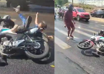 Veja motociclista e passageira caind0 em trecho na avenida Cosme Ferreira coberta por óleo; vídeo
