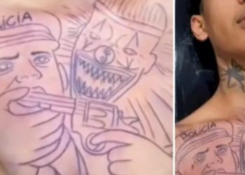Jovem tatua palhaço colocando pist0la na boca de PM e ainda grava o vídeo