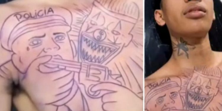 Jovem tatua palhaço colocando pist0la na boca de PM e ainda grava o vídeo