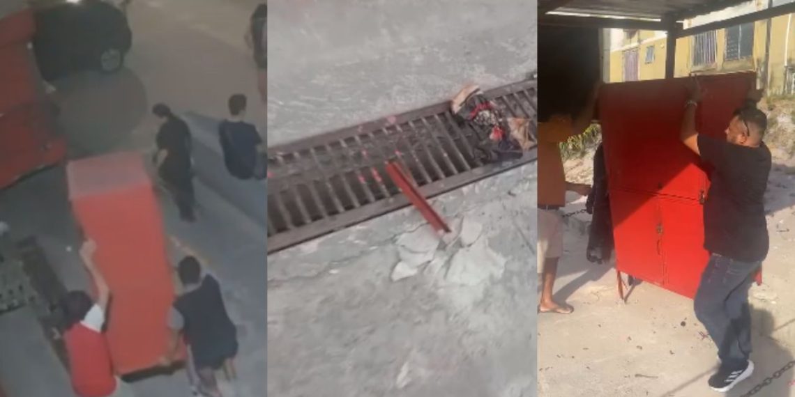 Câmera flagra grupo serrando box preso ao chão e levando estrutura em carro de mudança em Manaus