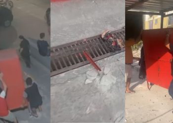 Câmera flagra grupo serrando box preso ao chão e levando estrutura em carro de mudança em Manaus