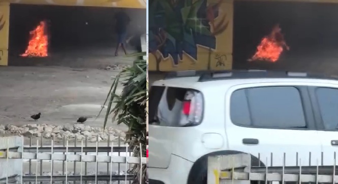 Vídeo: mesmo diante do fumaceiro, morador de rua abandona fogueira embaixo de viaduto em Manaus