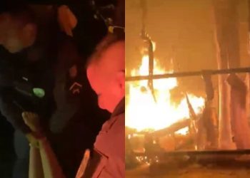 Vídeo: Em meio às chamas, policiais entram em casa pegando fogo e salvam mulher desacordada no Amazonas